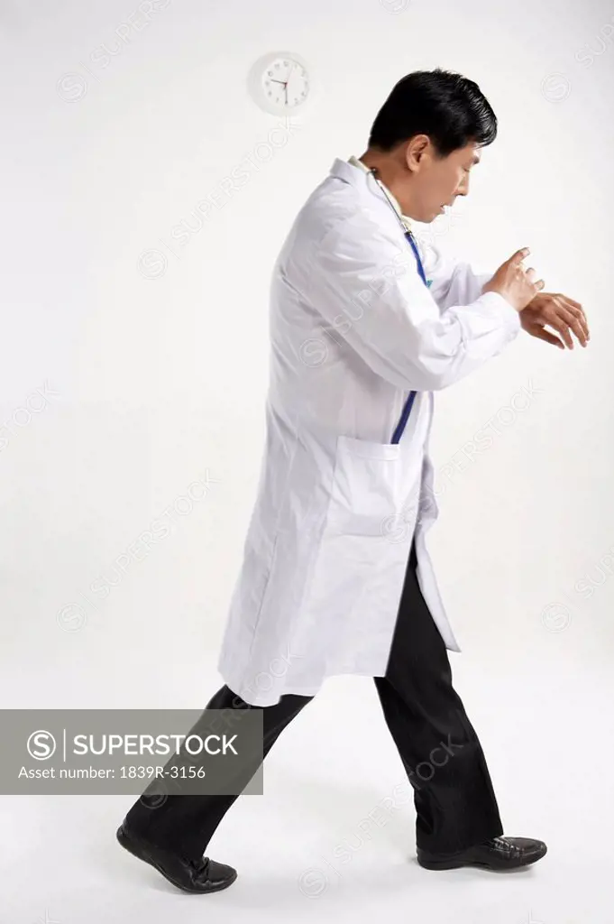 Doctor Looking At His Wristwatch