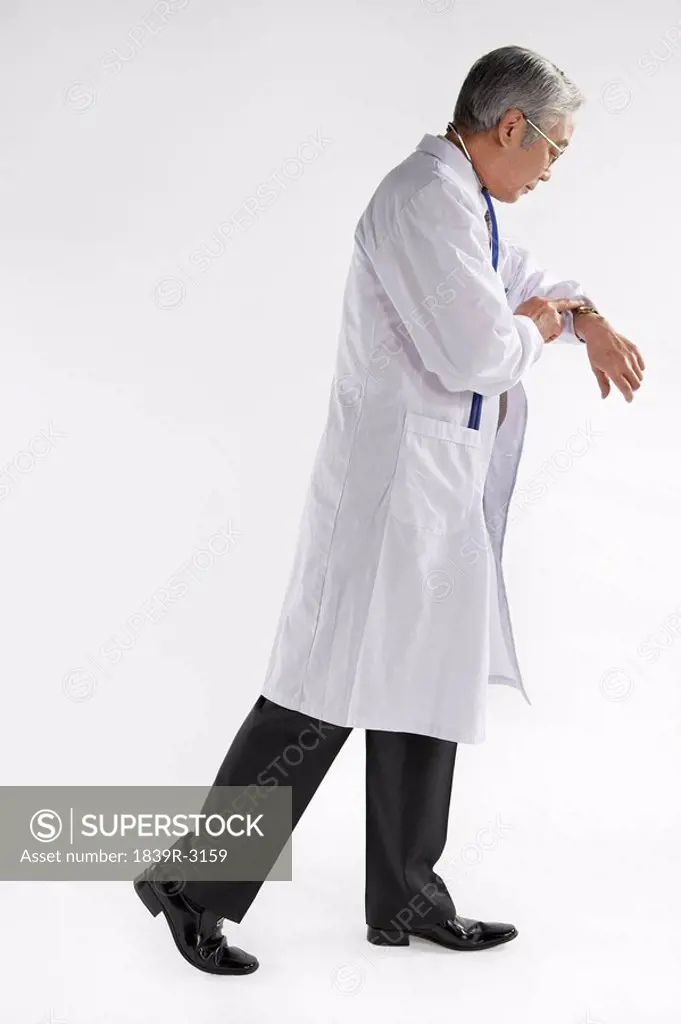 Doctor Looking At His Wristwatch