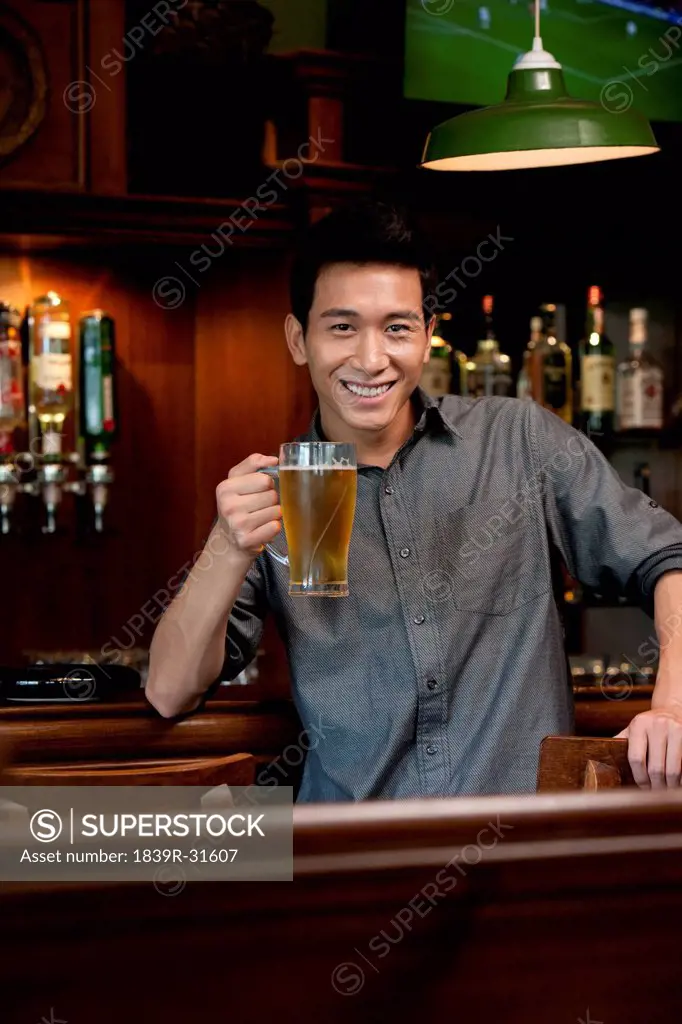 A Man Relaxing at a Bar