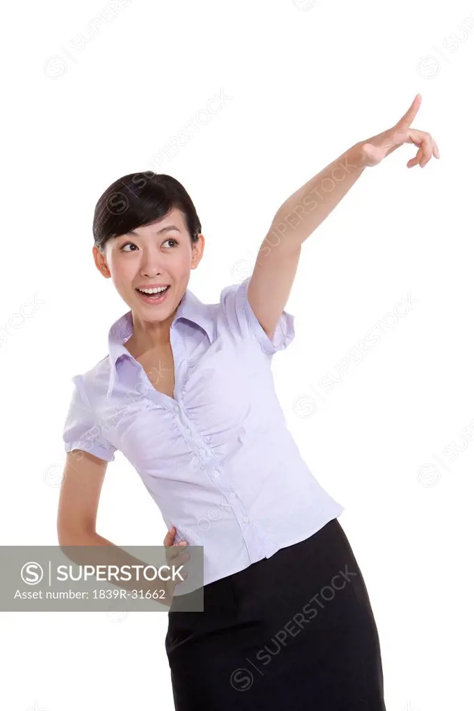 Excited Businesswoman Pointing
