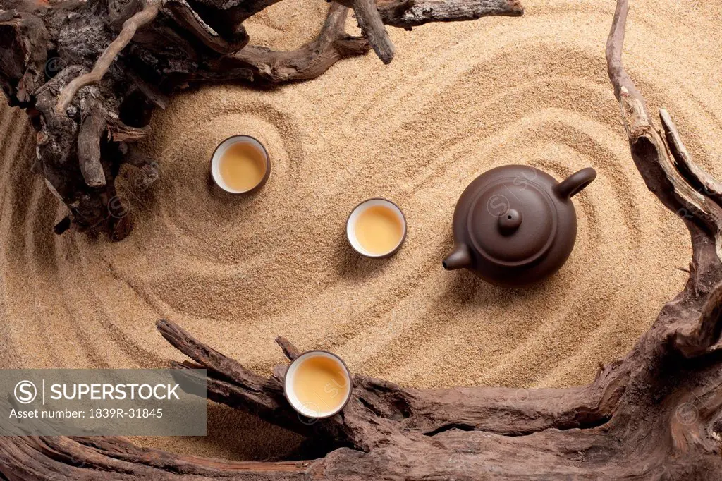 Tea set in sand