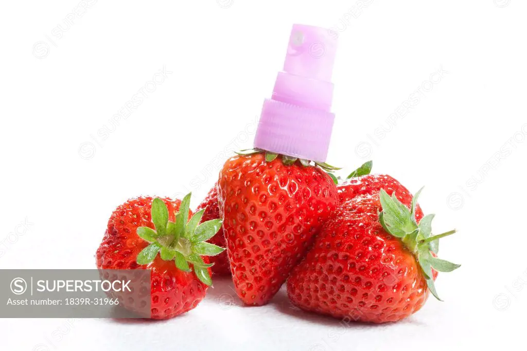 Strawberries and sprayer