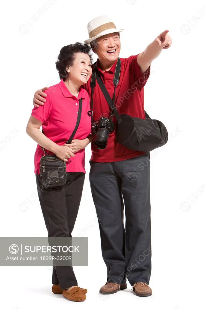 Portrait of senior couple travelling