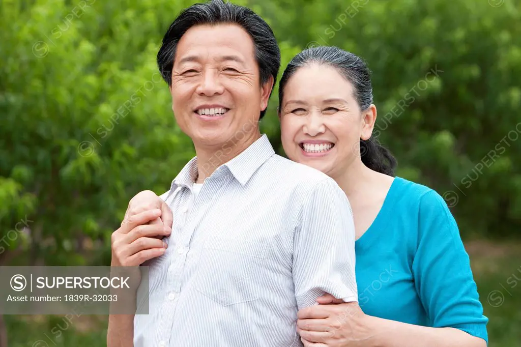 Happy senior couple in a park