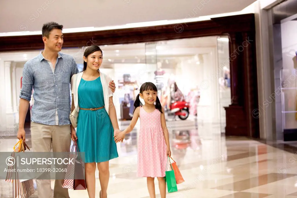 Family shopping in department store