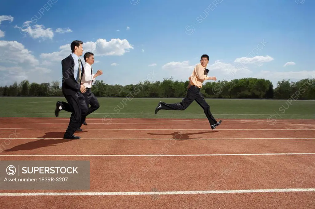 Businessmen Running Track