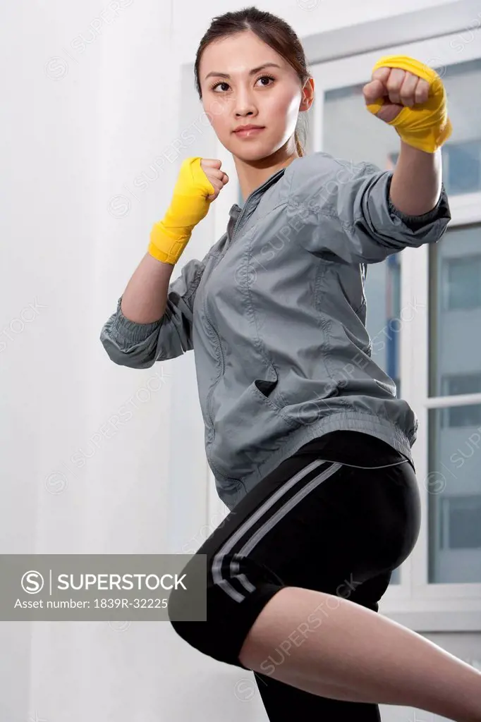 Determined Woman Boxing