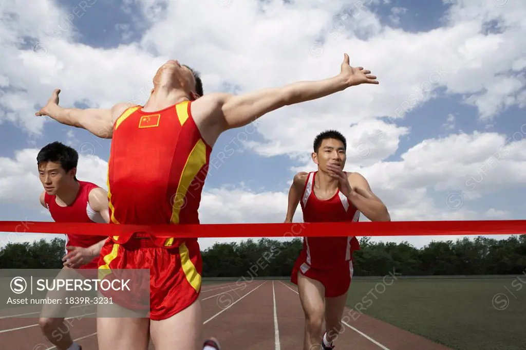 Athletes Running Track