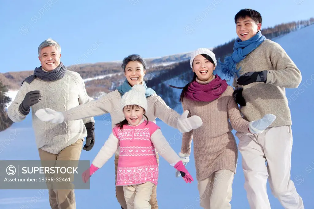 Family having fun in snow