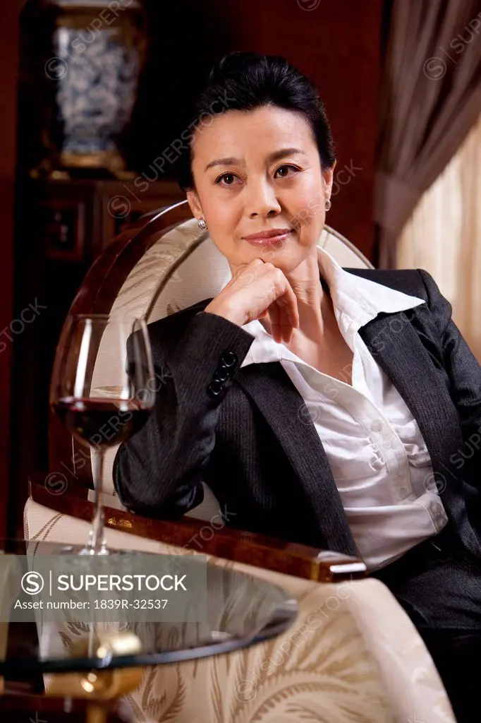 Mature businesswoman in a luxurious room