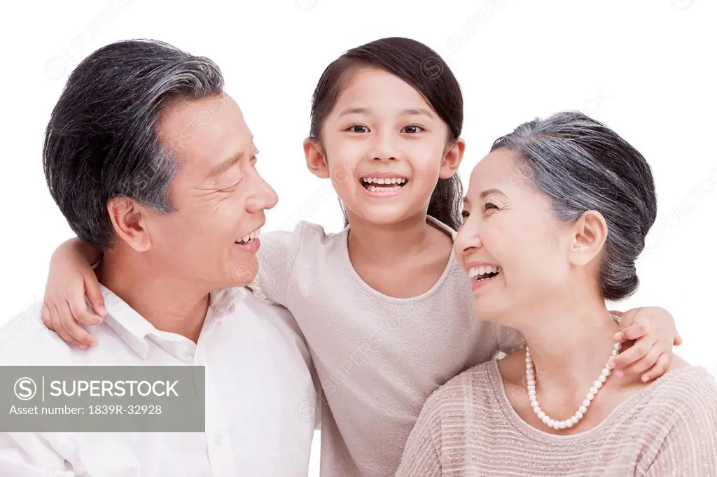 Cheerful granddaughter with grandparents