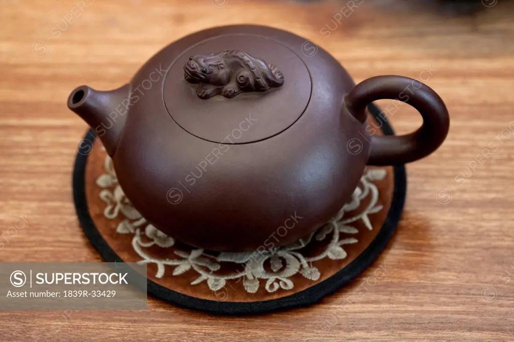 Close up of Chinese boccaro teapot