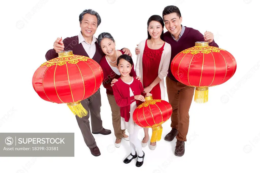 Happy family holding Chinese lantern