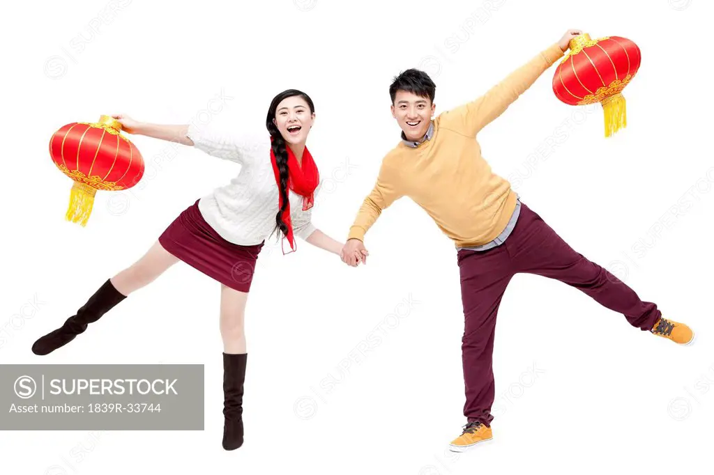 Young couple celebrating Chinese traditional New Year