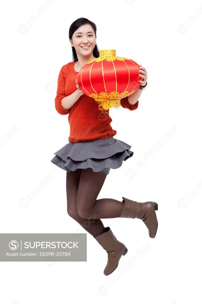 Happy young woman celebrating for Chinese New Year