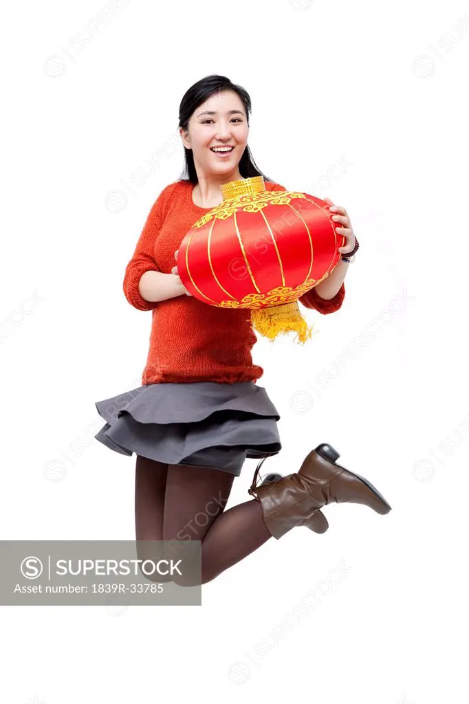 Happy young woman celebrating for Chinese New Year