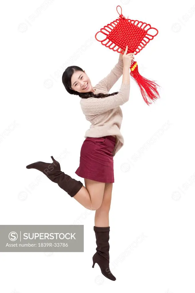 Young woman with Chinese lantern in New Year