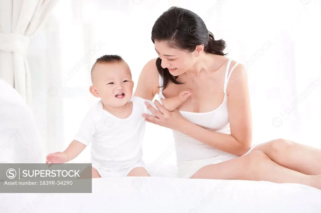 Mother and baby having a sweet time