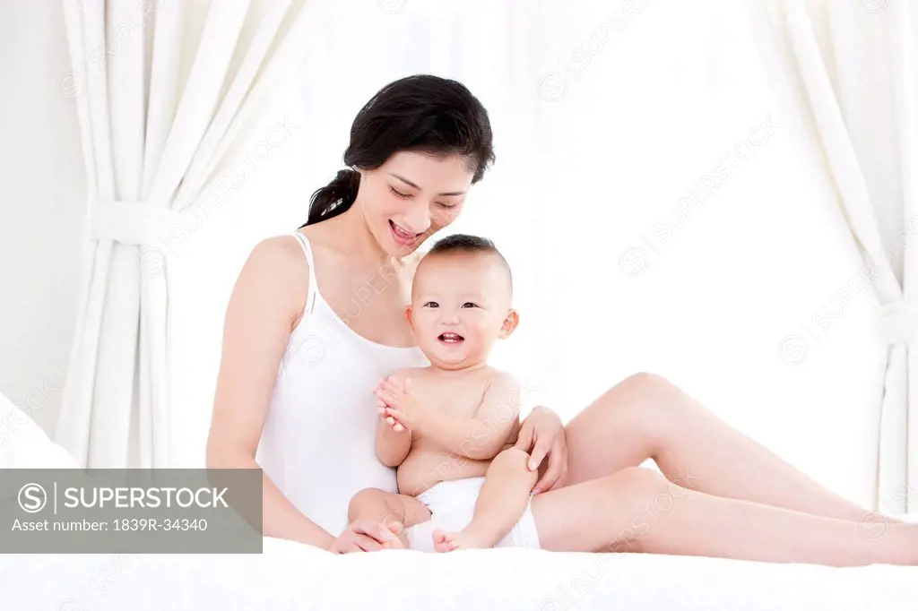 Tender moment between mother and baby