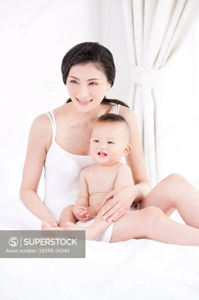 Tender moment between mother and baby