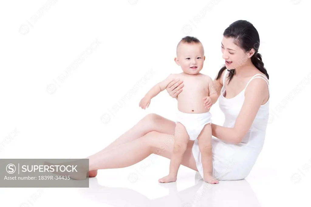 Cheerful woman with infant