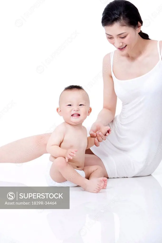 Young mother and cute infant
