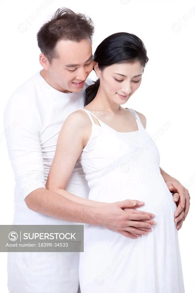 Happy young couple expecting a baby