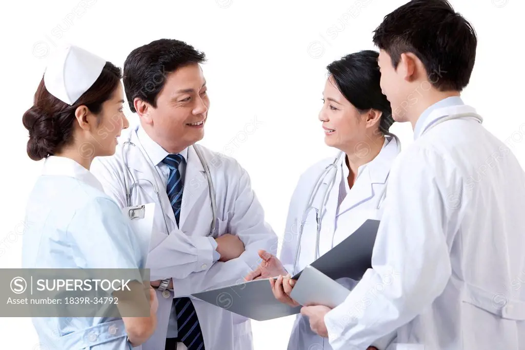 Happy professional medical team in discussion