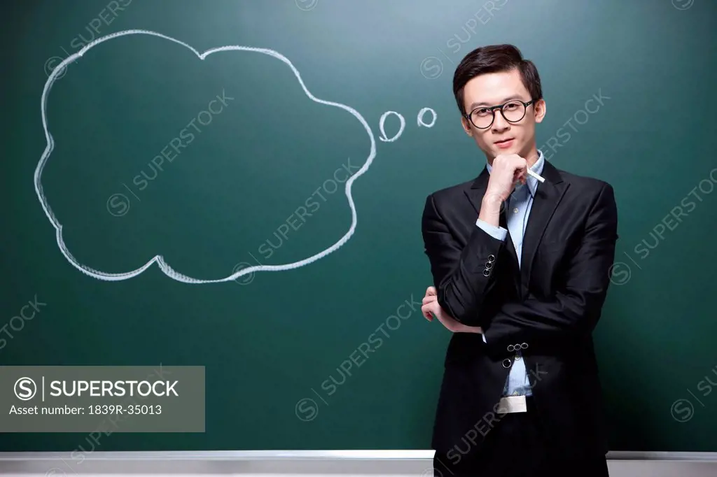 Serious male teacher in contemplation