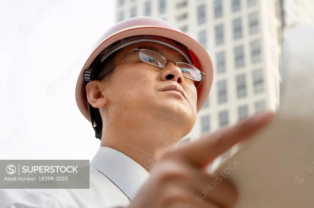 Construction Contractor Looking Into Distance