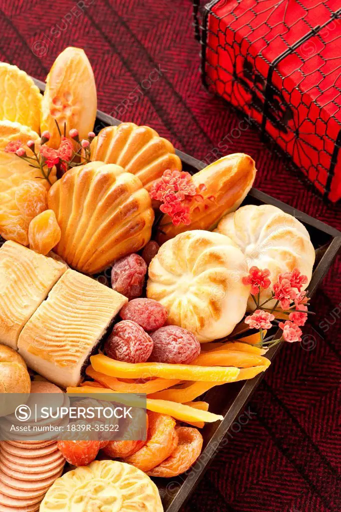 Various Chinese traditional dim sum and preserved fruits