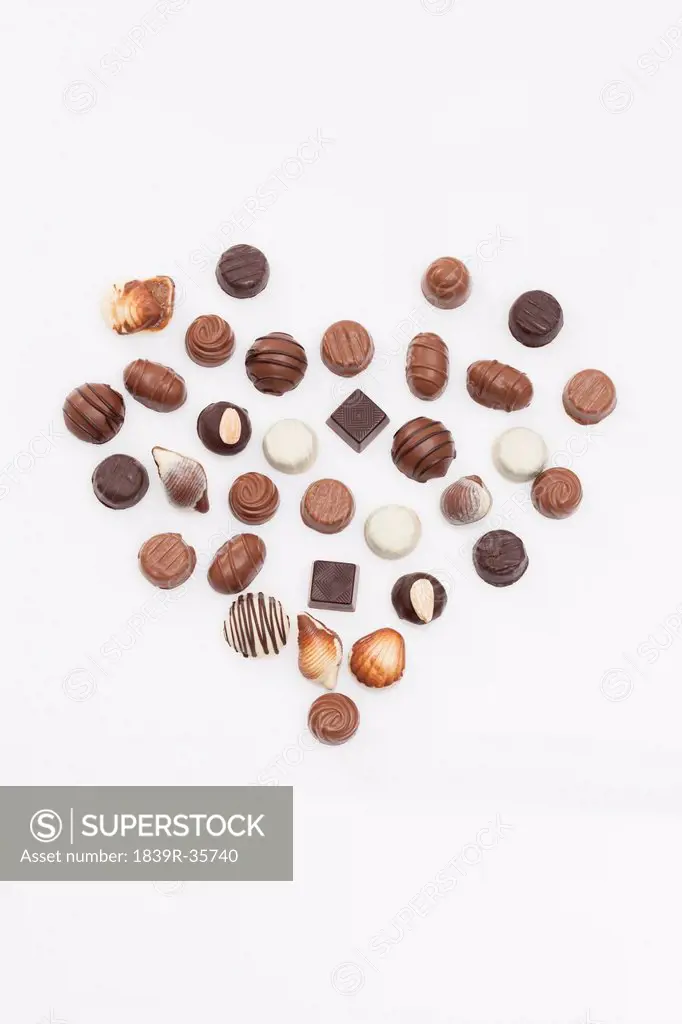 Various kinds of chocolate in a heart shape