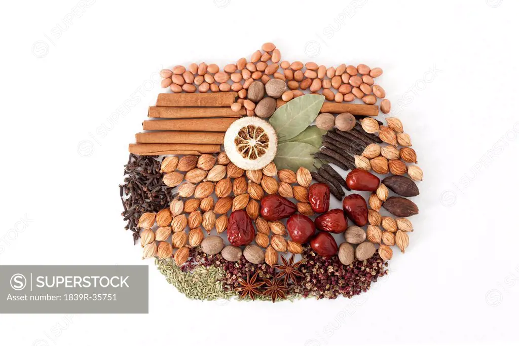 Assorted condiment and spices in stewpot shape