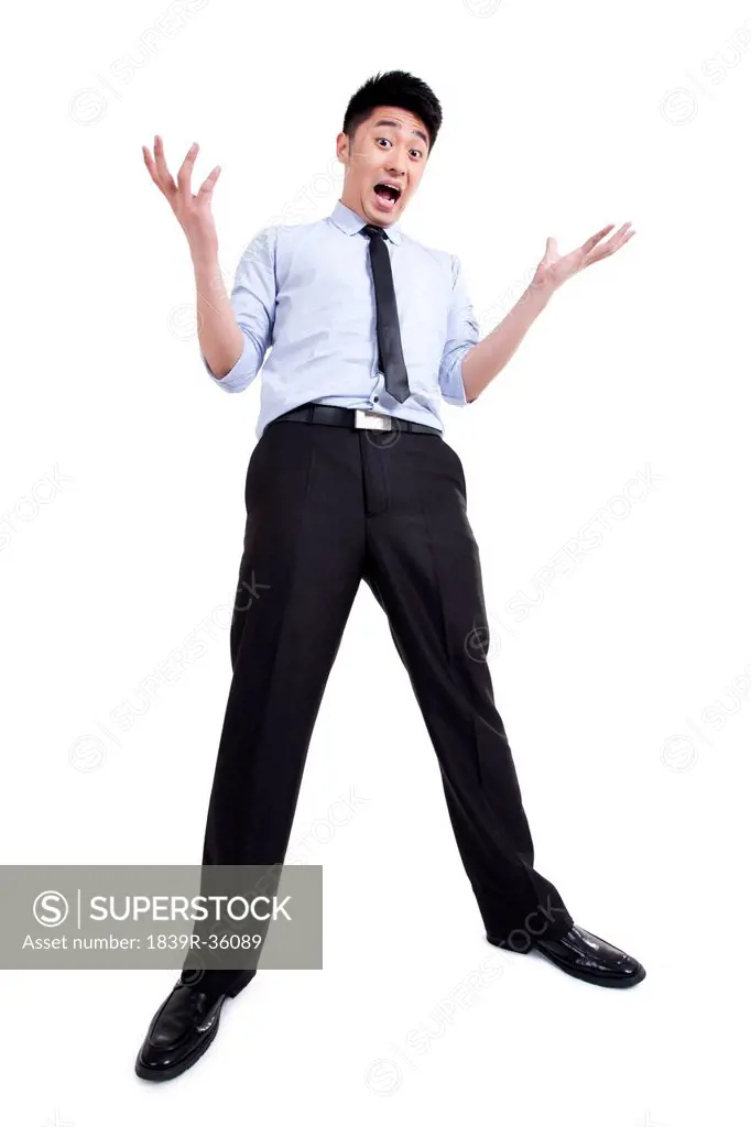 young businessman with surprised look on face