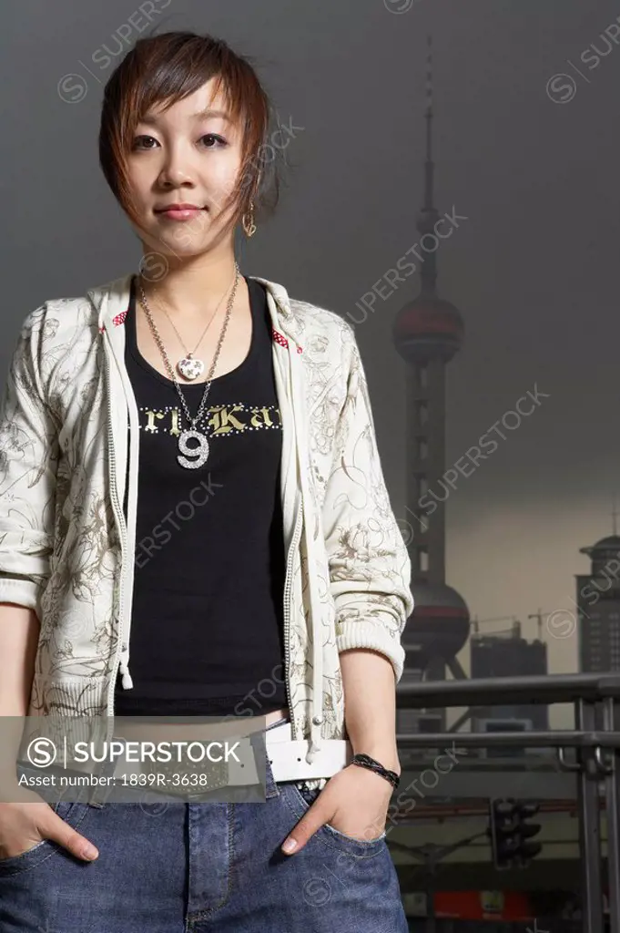 Portrait Of Teenage Girl In Front Of The Oriental Pearl Tower