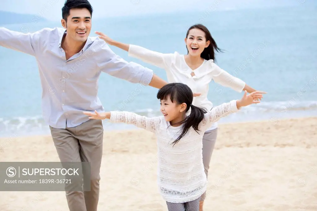 Sweet moment among young family on the beach of Repulse Bay, Hong Kong