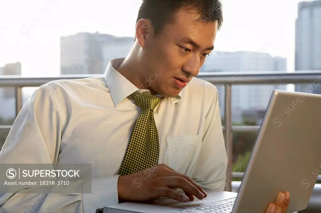 Businessman Working On Laptop