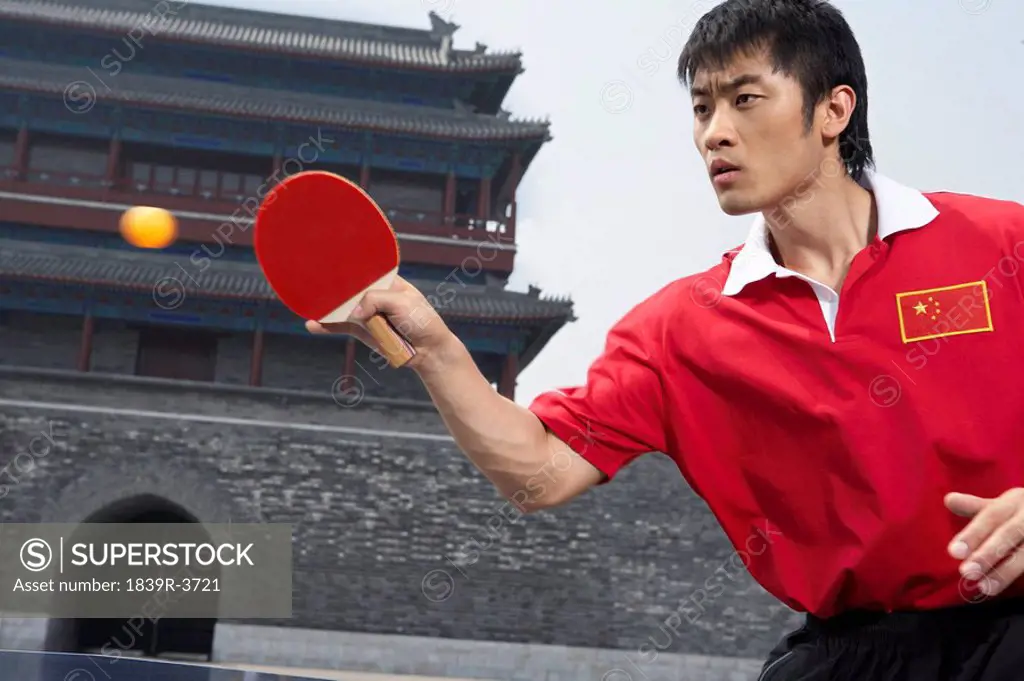 Ping Pong Player In Front Of A Temple