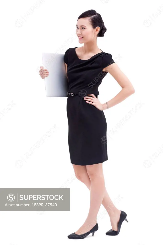 Fashionable businesswoman with laptop