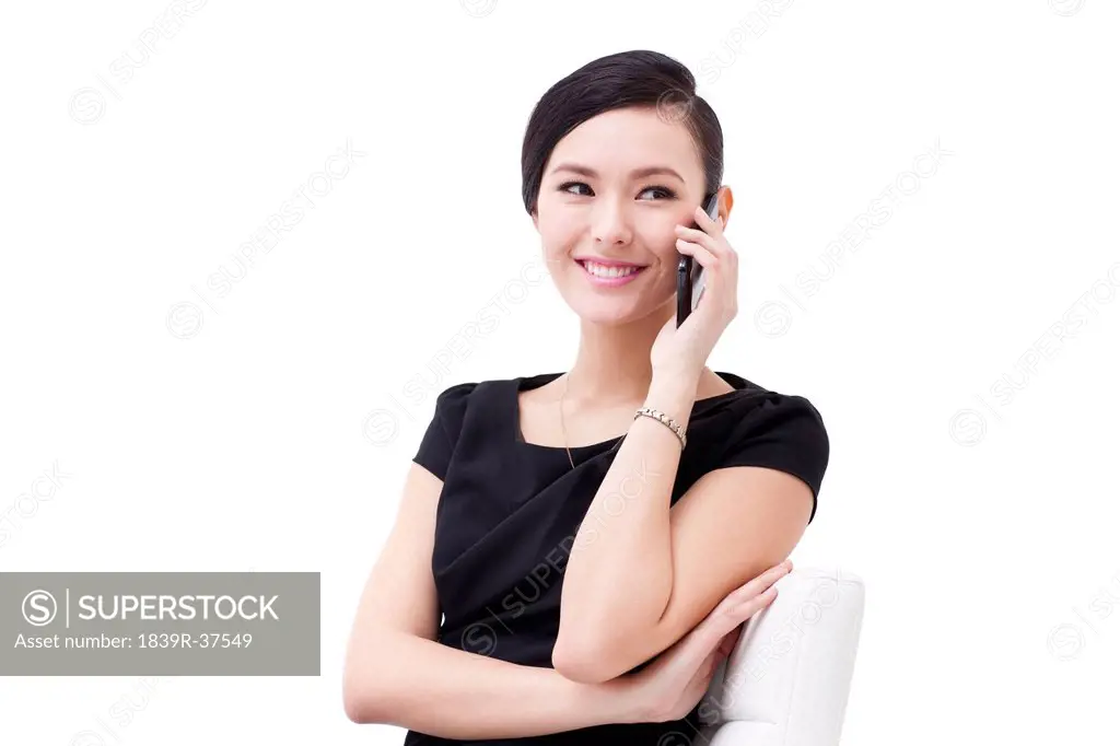 Fashionable businesswoman on the phone