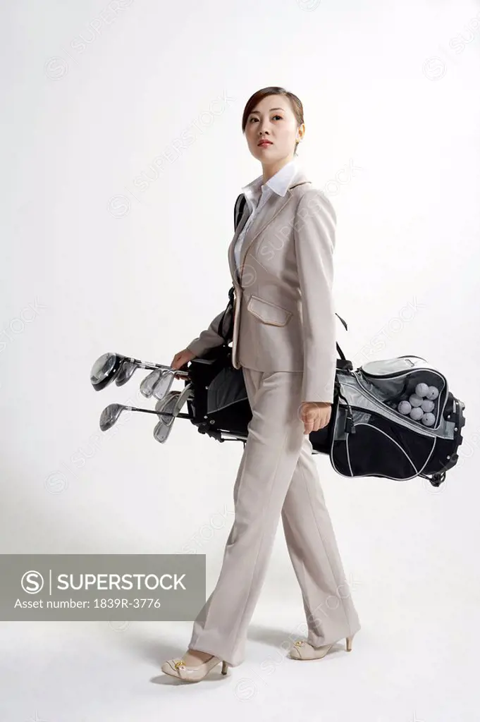 Businesswomen With Her Golf Bag