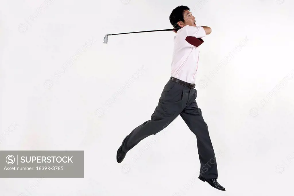 Businessman Playing Golf