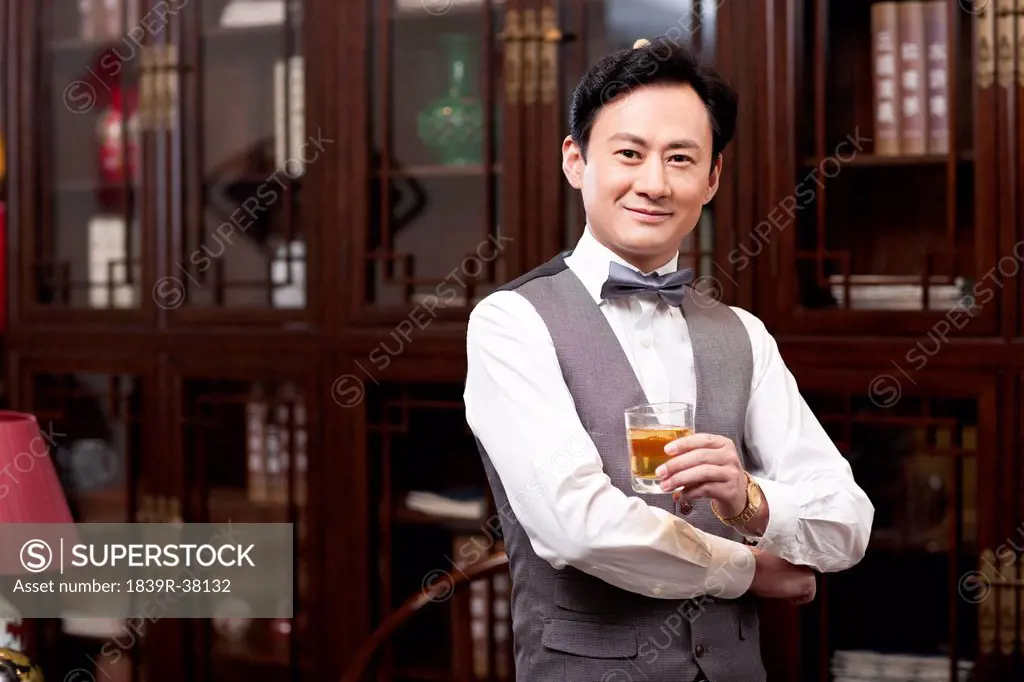 Wealthy businessman with wine