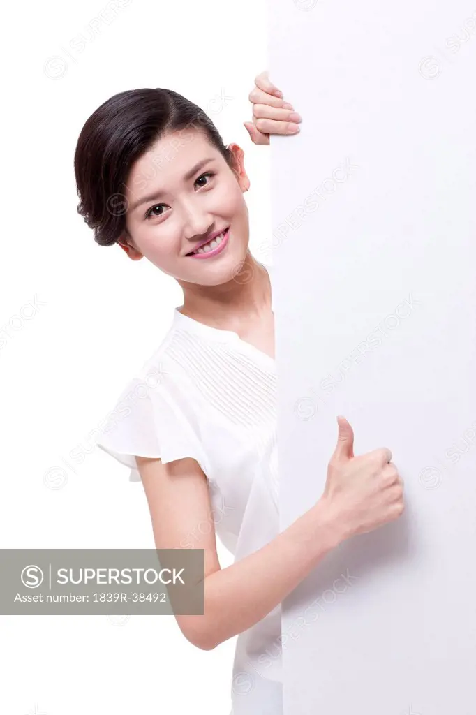 Joyful businesswoman with whiteboard