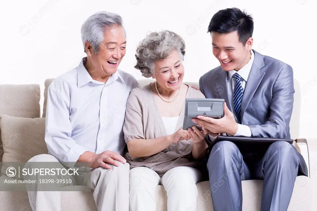 Senior couple with financial advisor