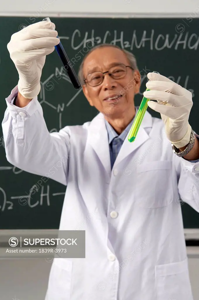 Scientist Holding Up Test Tube