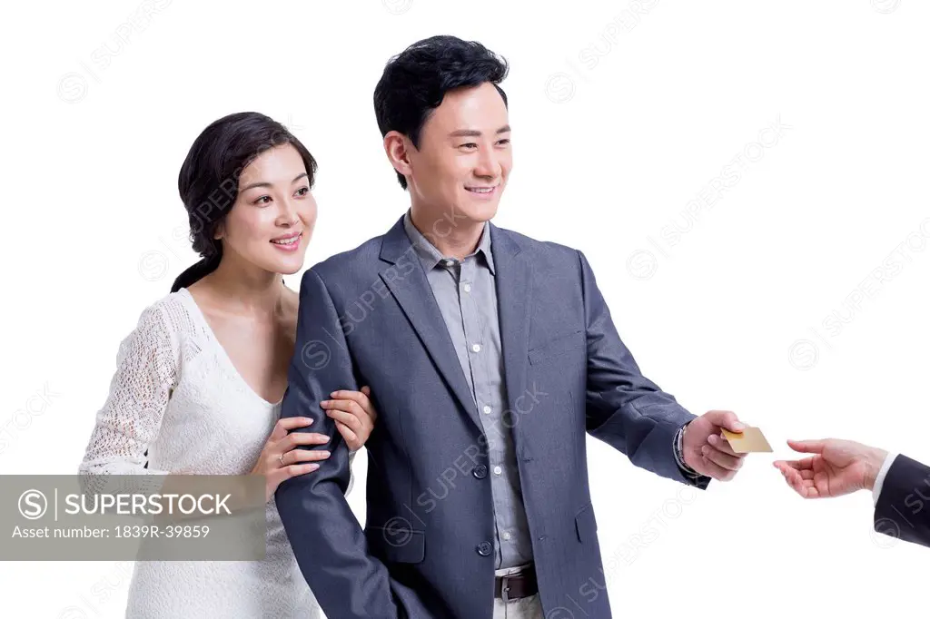 Couple using credit card