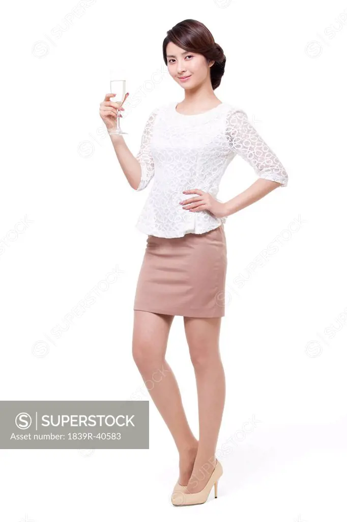 Happy young woman with champagne