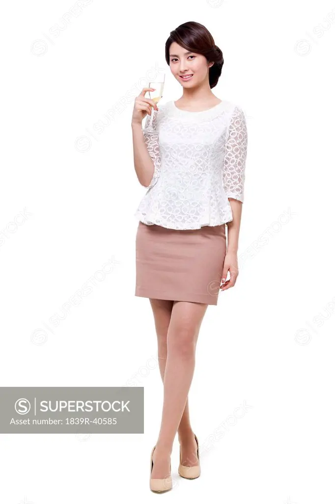 Happy young woman with champagne