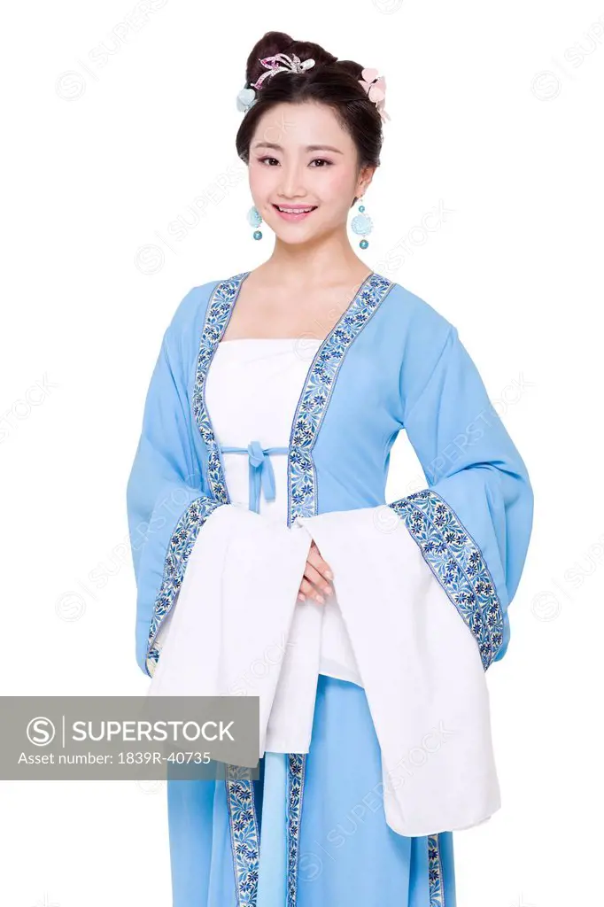 Young woman in Chinese traditional costume greeting